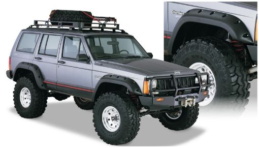 Picture of Bushwacker 84 - 01 Jeep Cherokee Cutout Style Flares 4pc Fits 4 - Door Sport Utility Only - Black