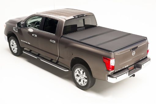 Picture of Extang 05 - 16 Nissan Frontier(5ft Bed) (w or wo Track Sys) (5ft) Solid Fold 2.0
